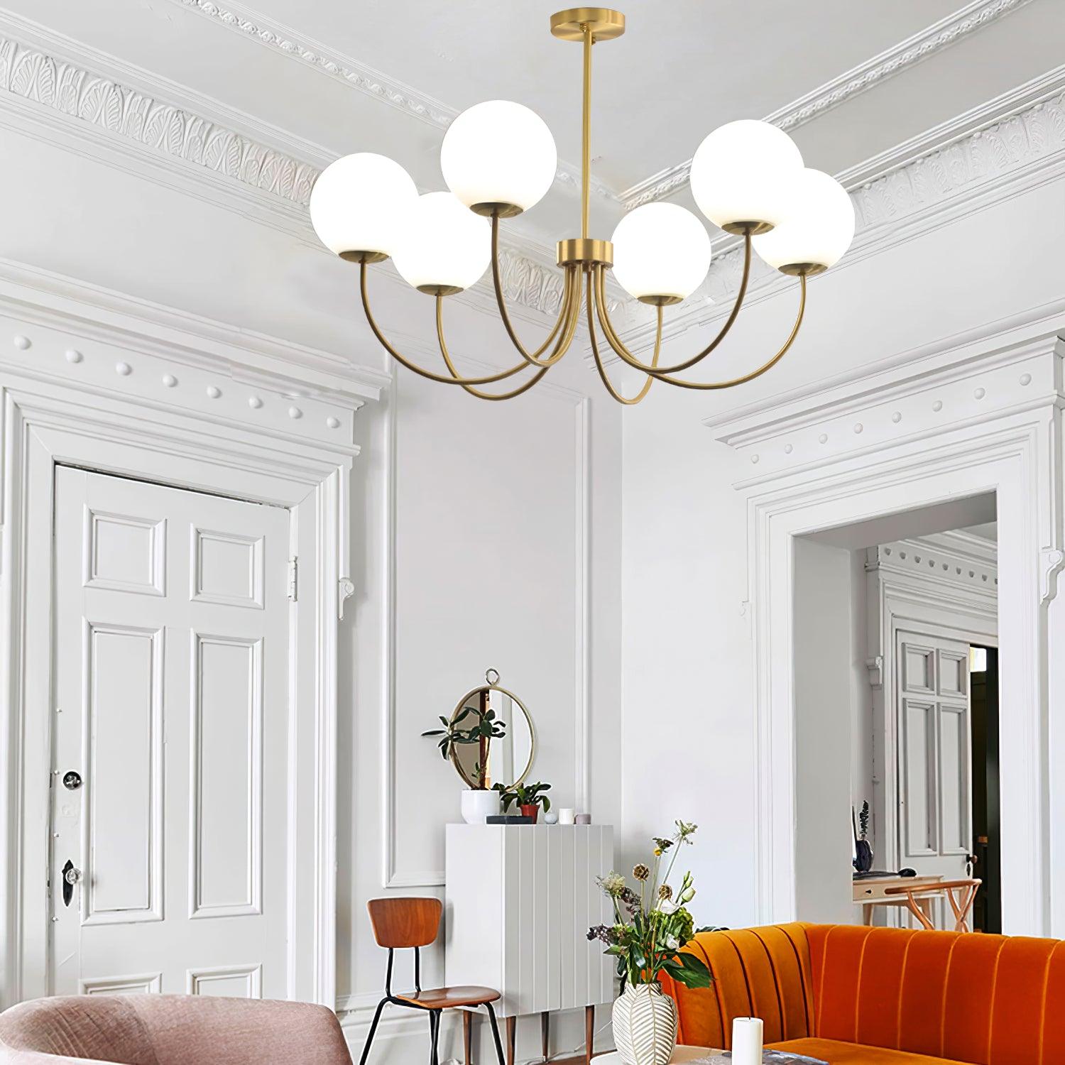Modern Brass Globe Crown Chandelier with Elegant Curved Arms and Glass Ball Shades