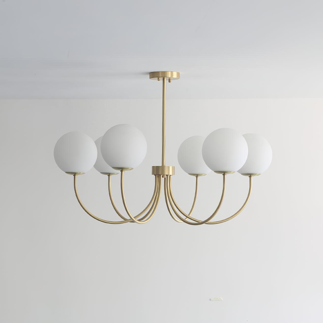 Modern Brass Globe Crown Chandelier with Elegant Curved Arms and Glass Ball Shades