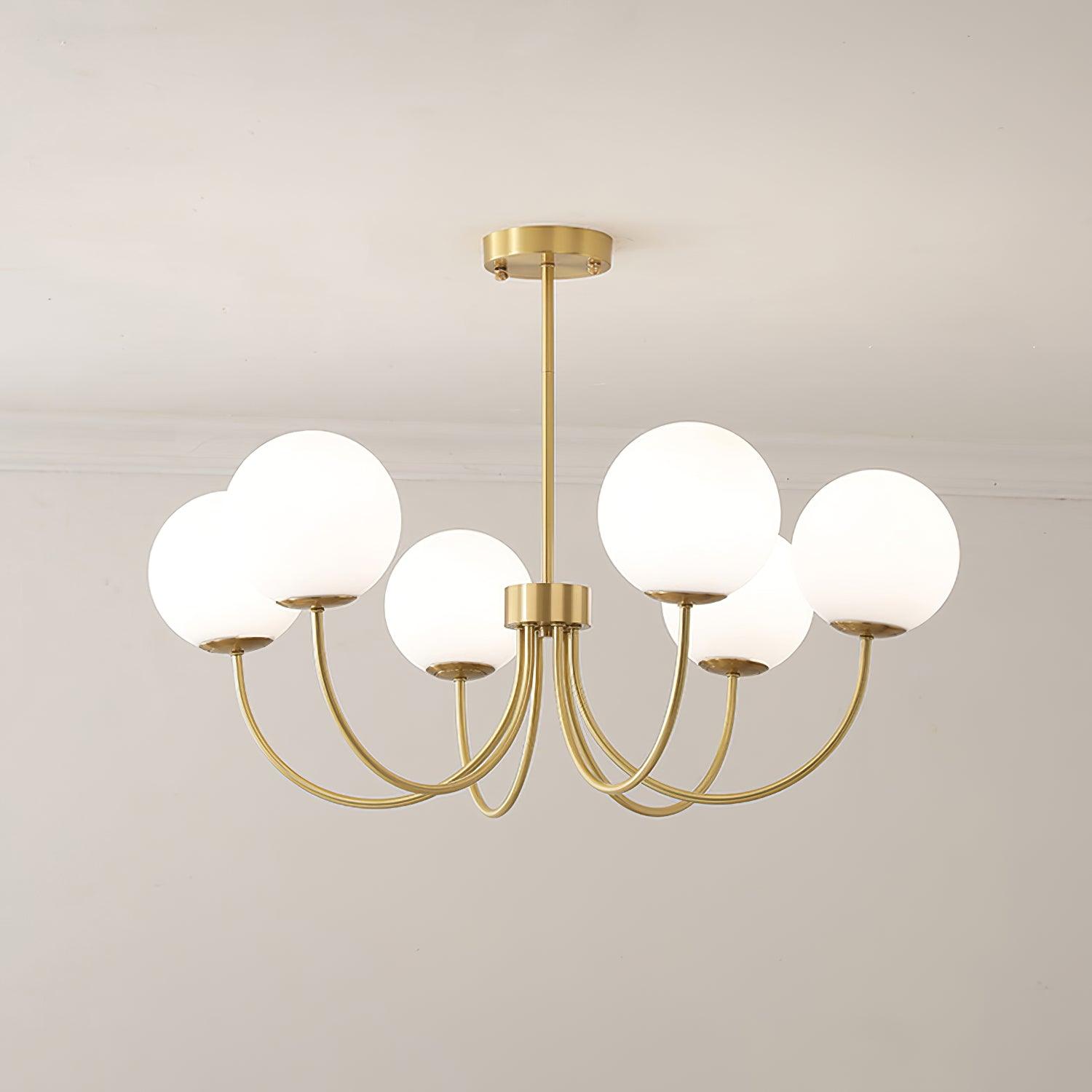Modern Brass Globe Crown Chandelier with Elegant Curved Arms and Glass Ball Shades
