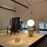 Modern Brass Rod Pendant Light with Spherical Mouth Blown Opal Glass Globe