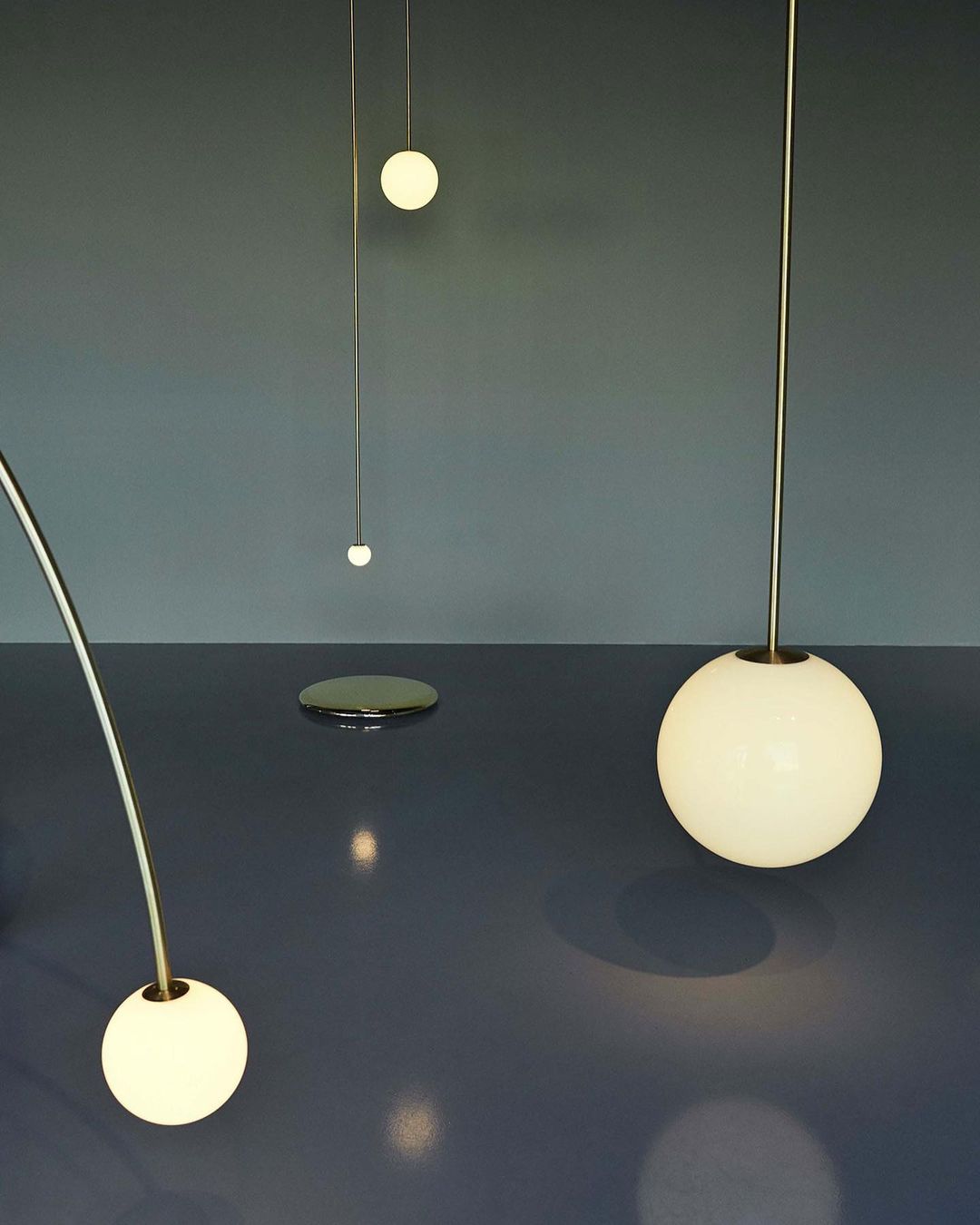 Modern Brass Rod Pendant Light with Spherical Mouth Blown Opal Glass Globe