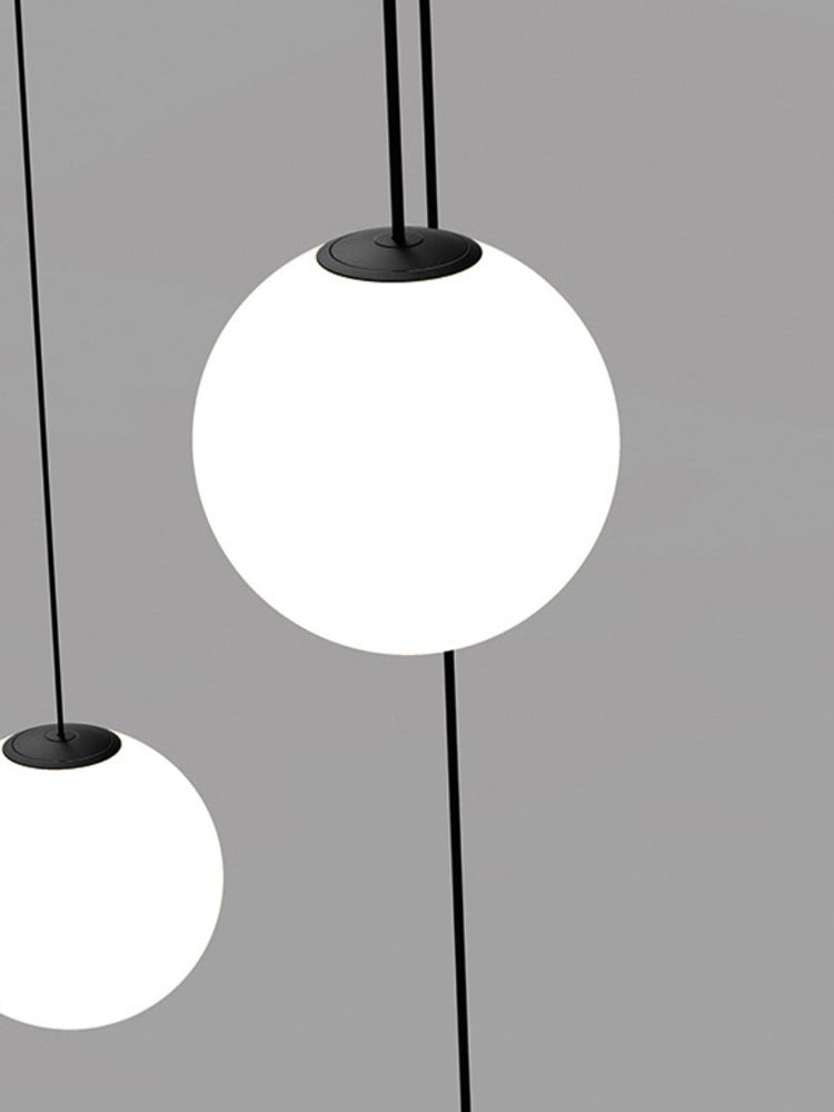 Modern Brass Rod Pendant Light with Spherical Mouth Blown Opal Glass Globe