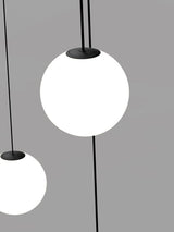 Modern Brass Rod Pendant Light with Spherical Mouth Blown Opal Glass Globe