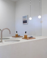 Modern Brass Rod Pendant Light with Spherical Mouth Blown Opal Glass Globe