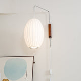 Modern Bubble Ball Wall Sconce with Walnut Accents and Adjustable Swivel Arm