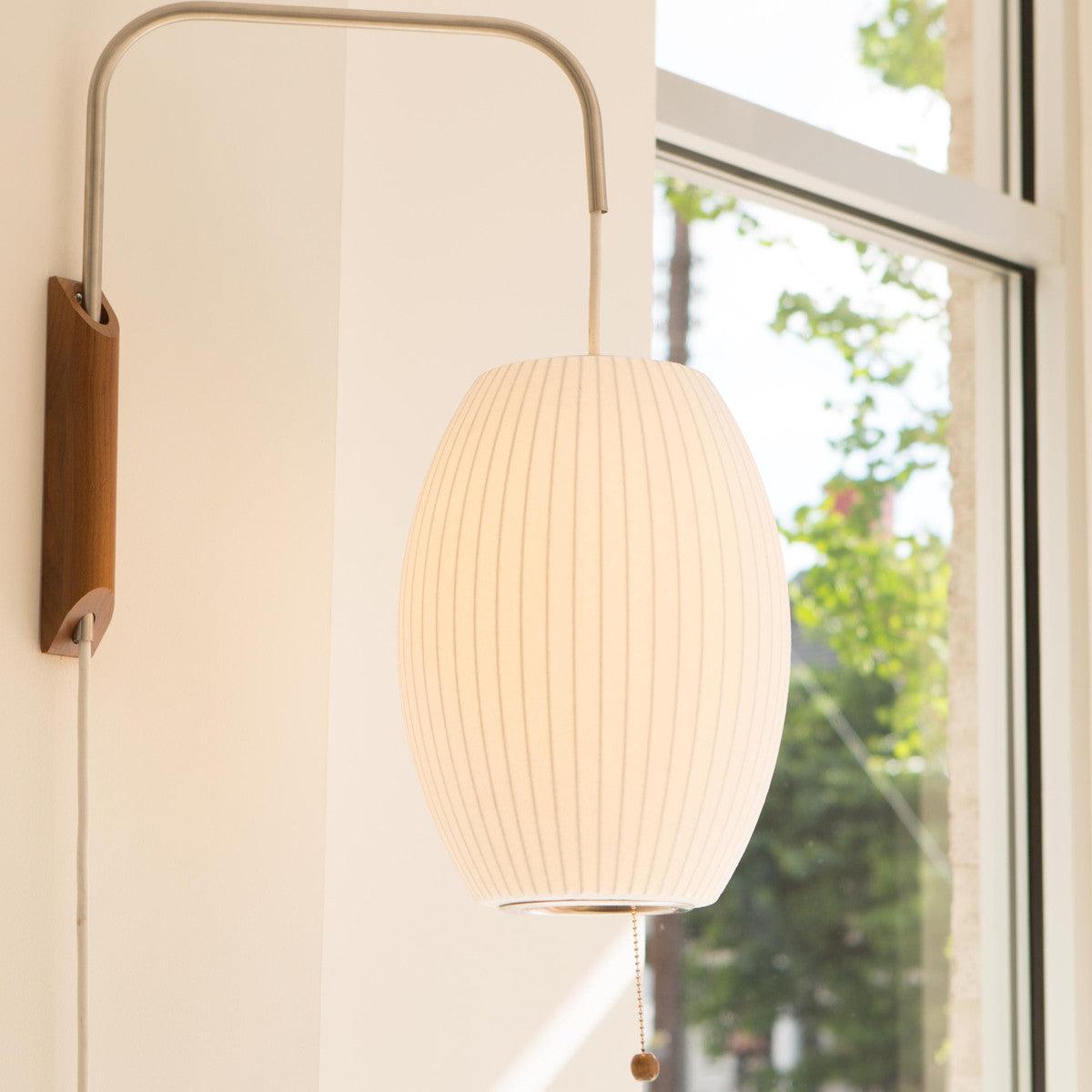 Modern Bubble Ball Wall Sconce with Walnut Accents and Adjustable Swivel Arm
