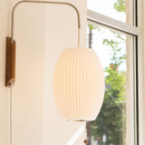Modern Bubble Ball Wall Sconce with Walnut Accents and Adjustable Swivel Arm