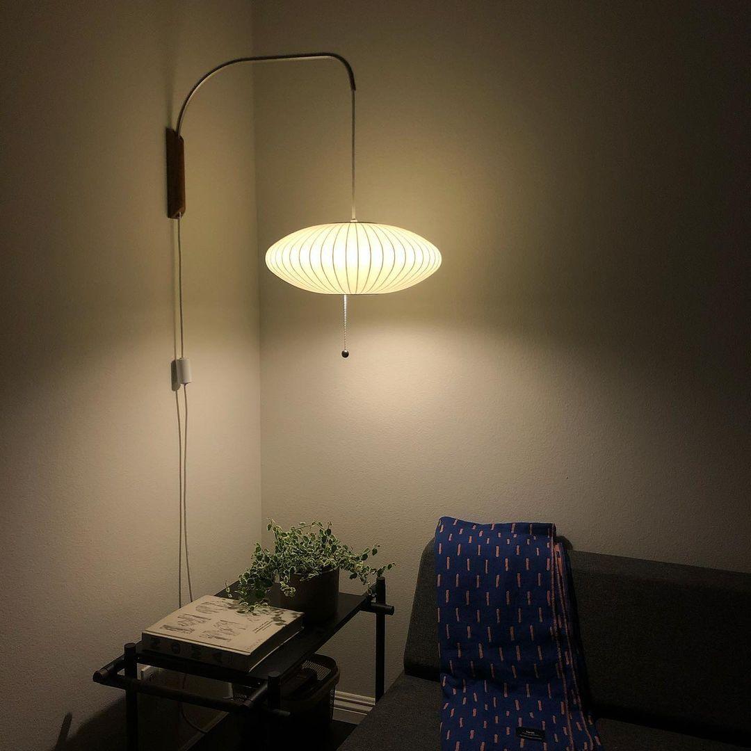 Modern Bubble Ball Wall Sconce with Walnut Accents and Adjustable Swivel Arm