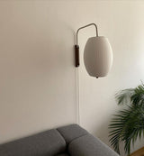 Modern Bubble Ball Wall Sconce with Walnut Accents and Adjustable Swivel Arm