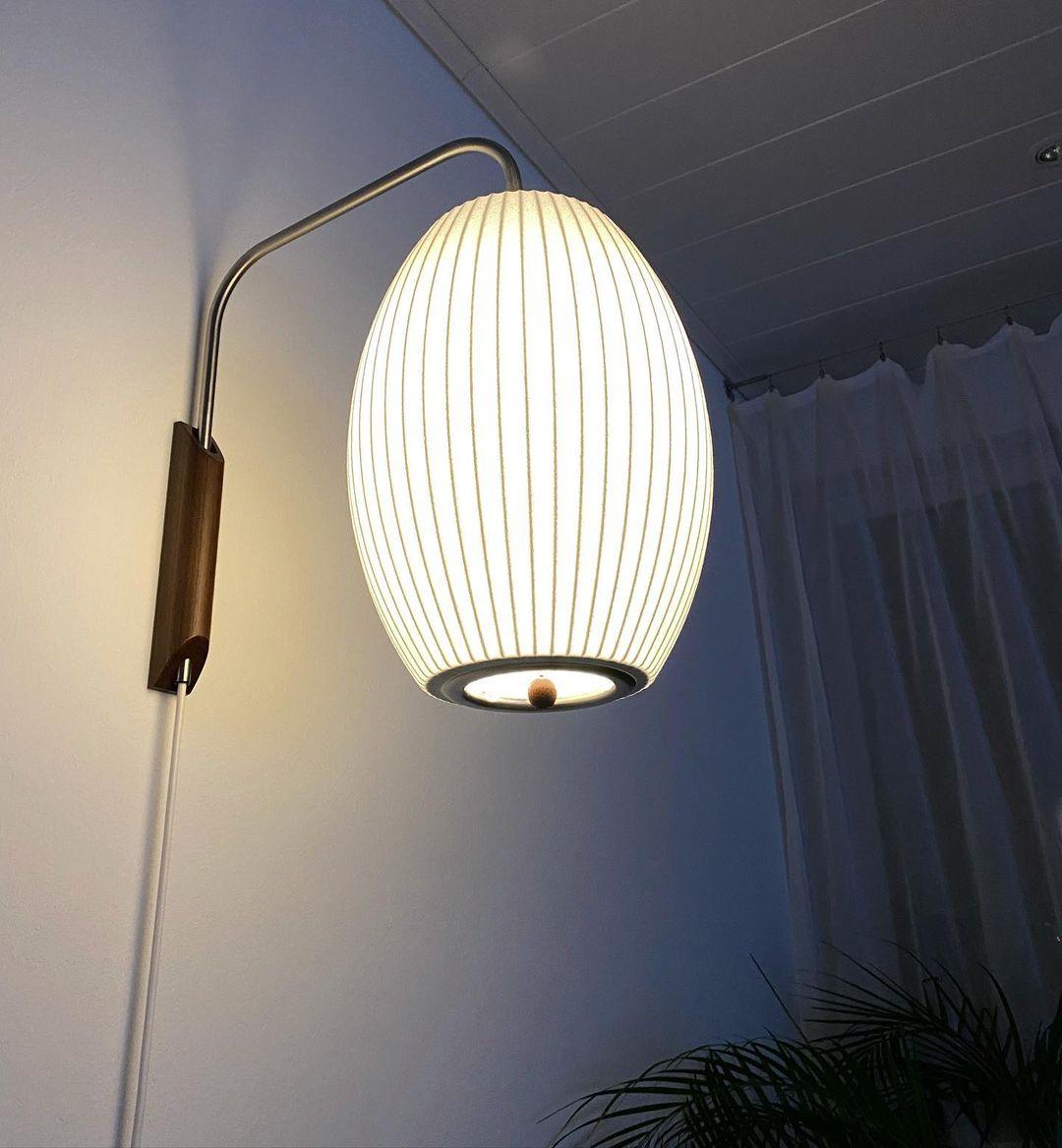 Modern Bubble Ball Wall Sconce with Walnut Accents and Adjustable Swivel Arm