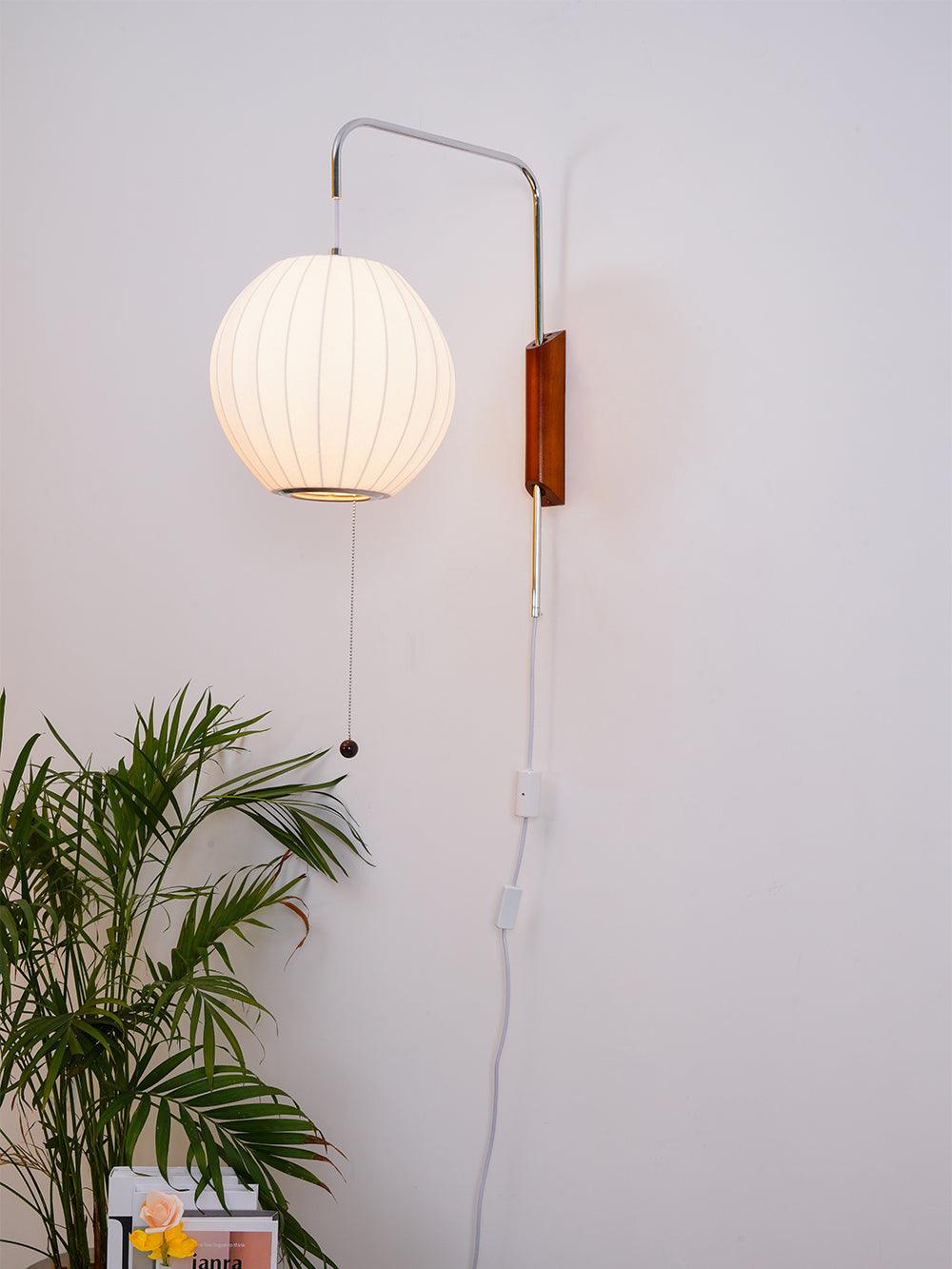 Modern Bubble Ball Wall Sconce with Walnut Accents and Adjustable Swivel Arm