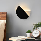 Modern Circular Black Rotatable LED Wall Sconce for Minimalist Living Room and Bedroom Lighting