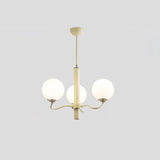 Modern Creamy Yellow Globe Glass Chandelier with White Spherical Shades