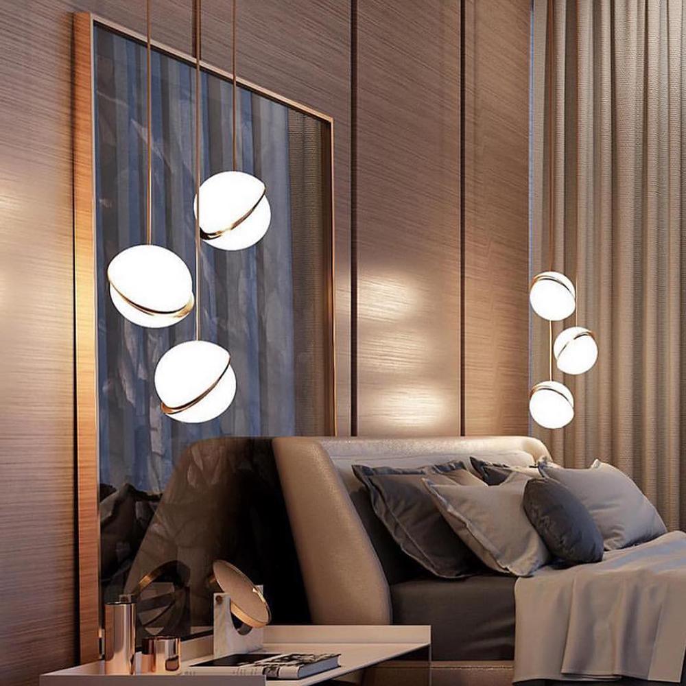 Modern Crescent Brass Pendant Light with Opal Globe Shade and Brushed Fascia
