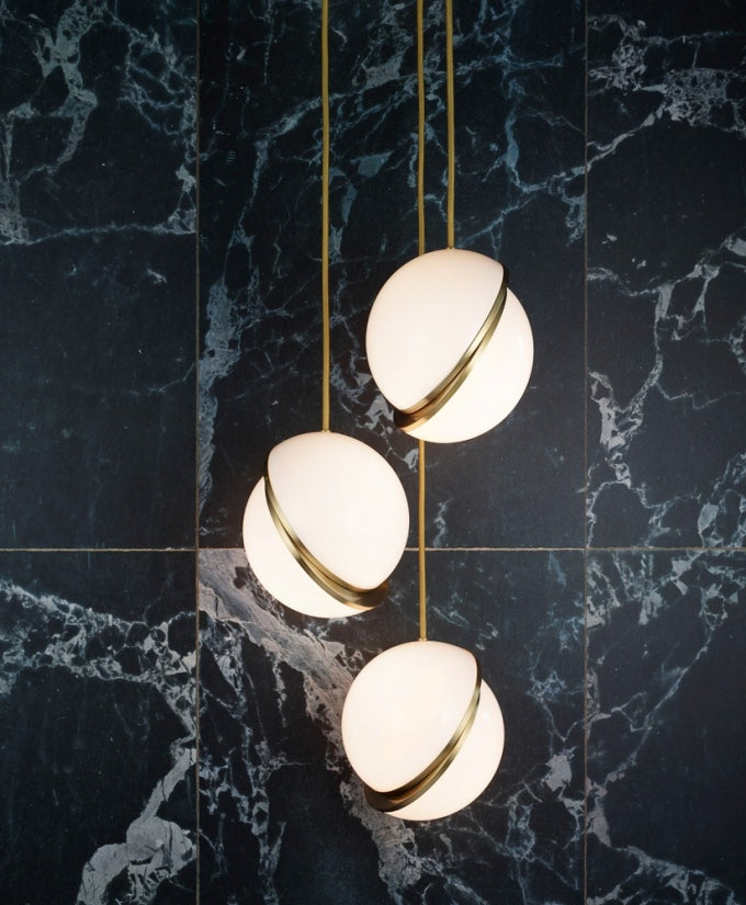 Modern Crescent Brass Pendant Light with Opal Globe Shade and Brushed Fascia