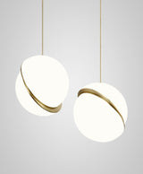 Modern Crescent Brass Pendant Light with Opal Globe Shade and Brushed Fascia