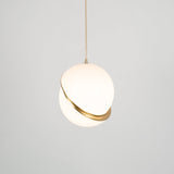Modern Crescent Brass Pendant Light with Opal Globe Shade and Brushed Fascia