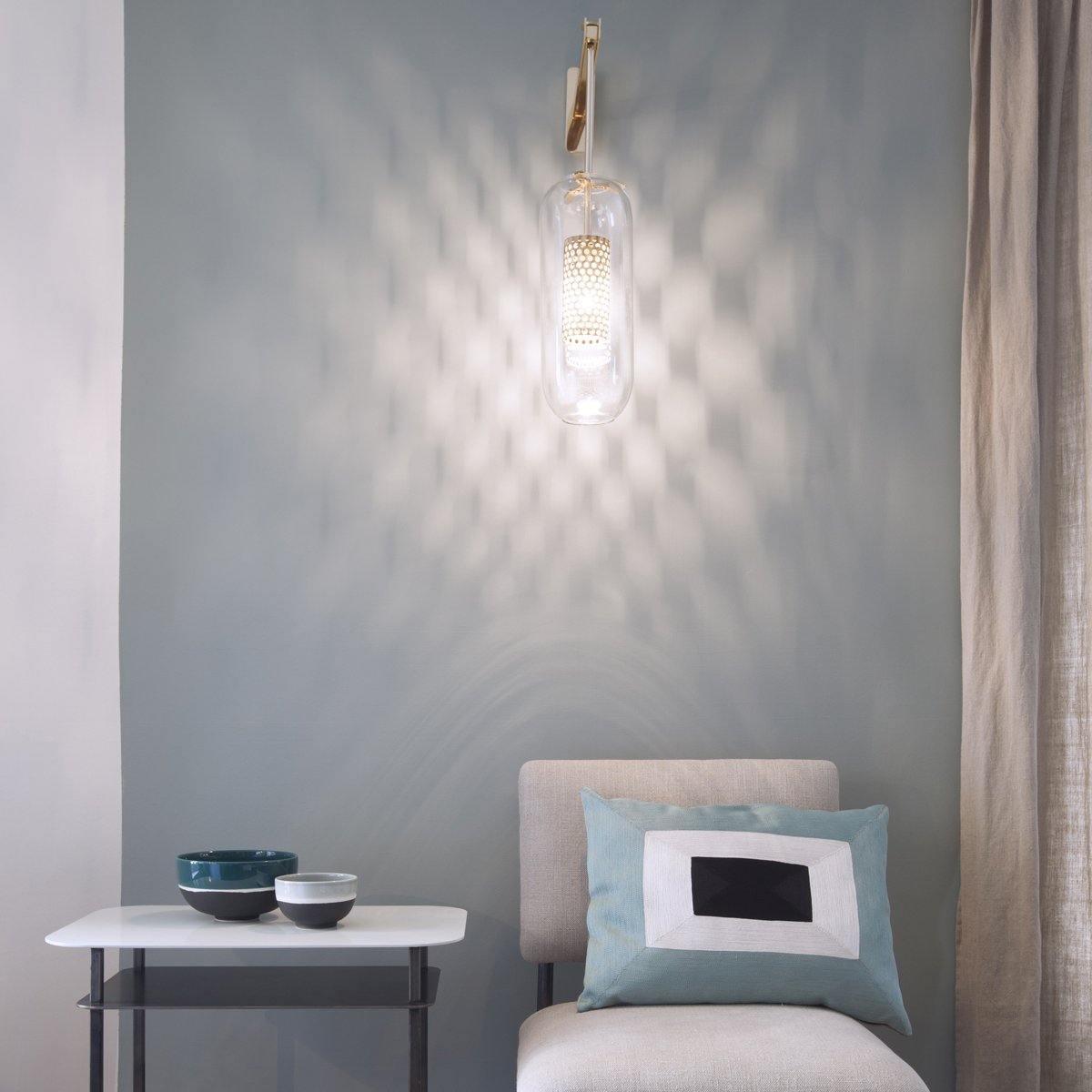modern-cylinder-glass-wall-sconce-with-perforated-metal-cage-and-steel-accents-for-home-decor