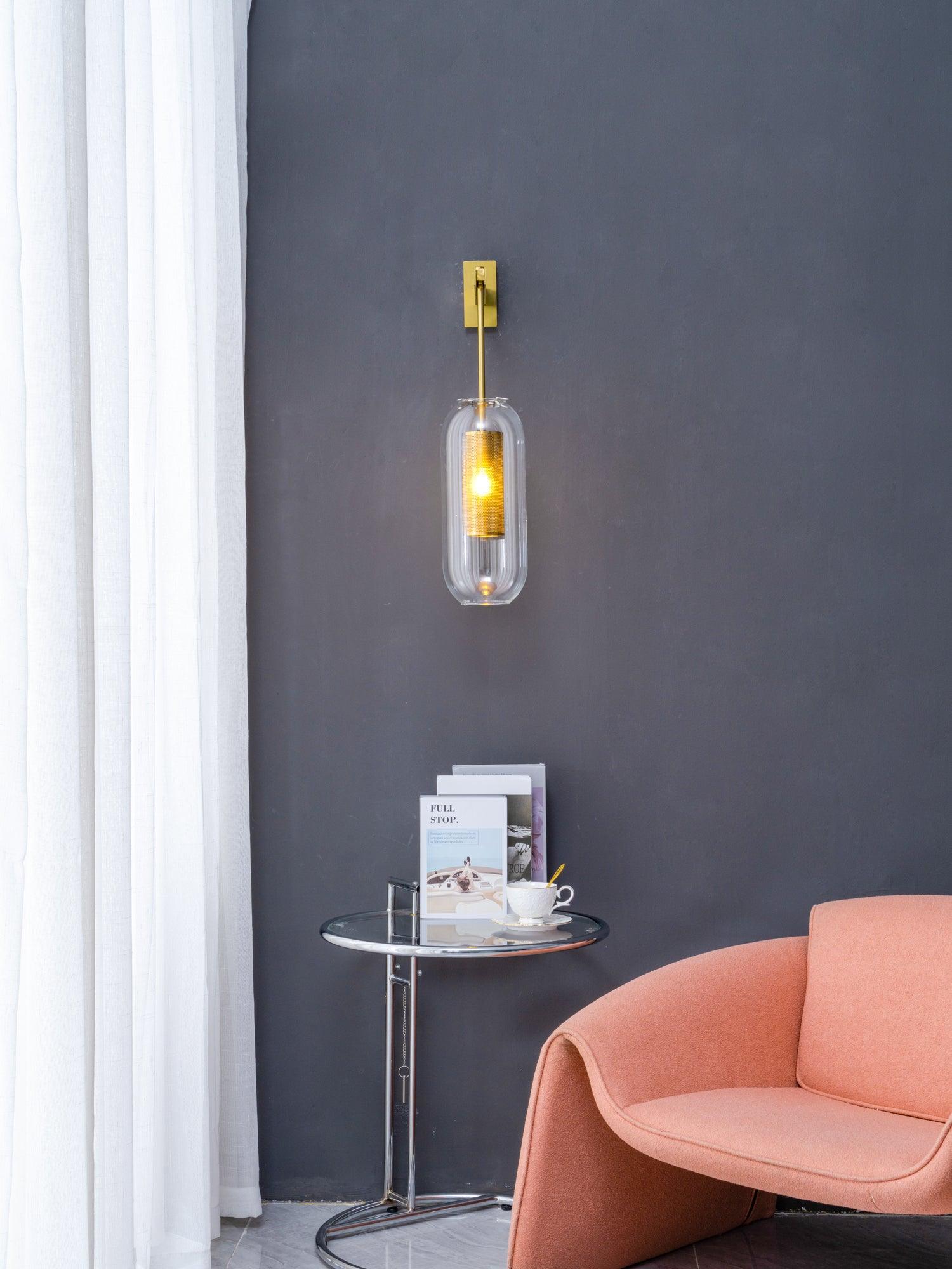 modern-cylinder-glass-wall-sconce-with-perforated-metal-cage-and-steel-accents-for-home-decor