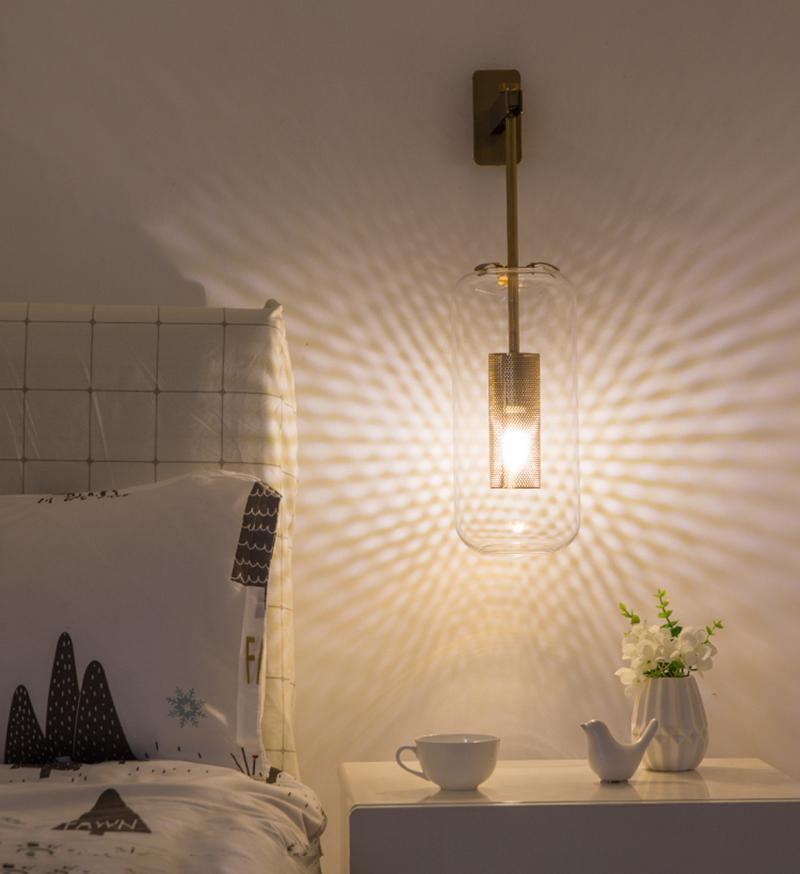 modern-cylinder-glass-wall-sconce-with-perforated-metal-cage-and-steel-accents-for-home-decor