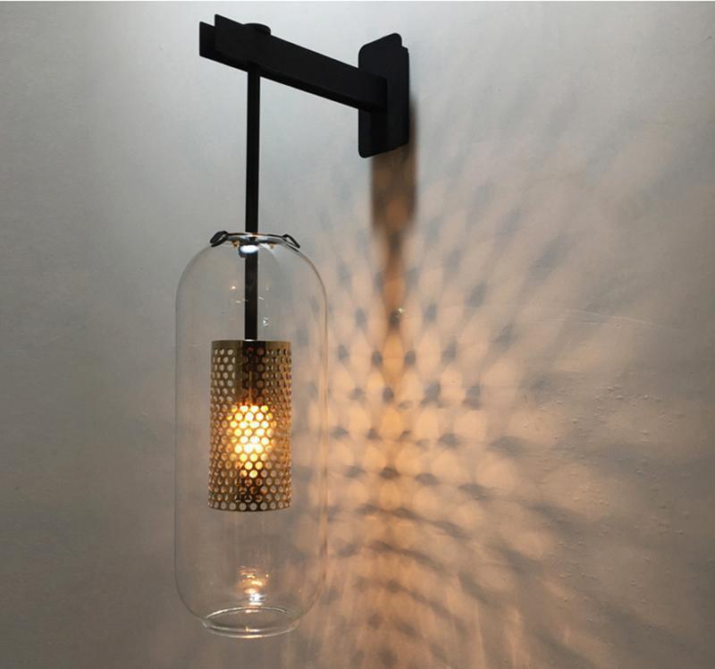 modern-cylinder-glass-wall-sconce-with-perforated-metal-cage-and-steel-accents-for-home-decor