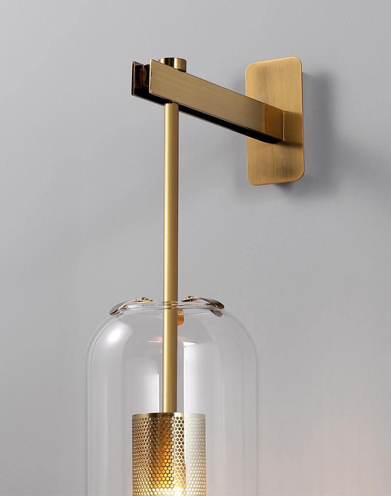 modern-cylinder-glass-wall-sconce-with-perforated-metal-cage-and-steel-accents-for-home-decor