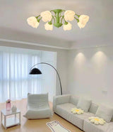 modern-floral-rose-petal-flush-mount-ceiling-light-with-white-flower-shades-and-green-finish