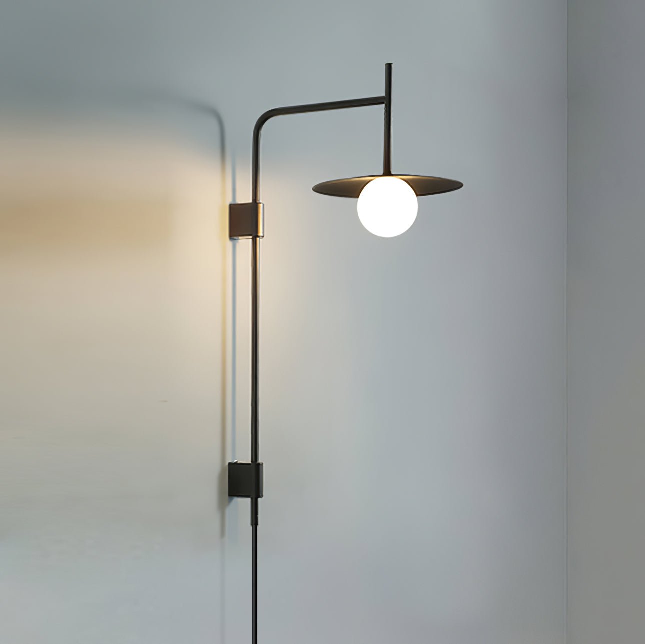 Modern Gea Swing Arm Wall Lamp with Frosted Glass Shade and Adjustable Iron Frame for Indoor Lighting