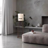 modern-geometric-standing-lamp-with-white-fabric-shade-in-brushed-bronze-finish