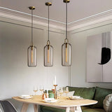 Modern Glass Capsule and Sphere Pendant Light with Copper Finish for Interior Decor