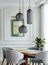 Modern Glass Capsule and Sphere Pendant Light with Copper Finish for Interior Decor