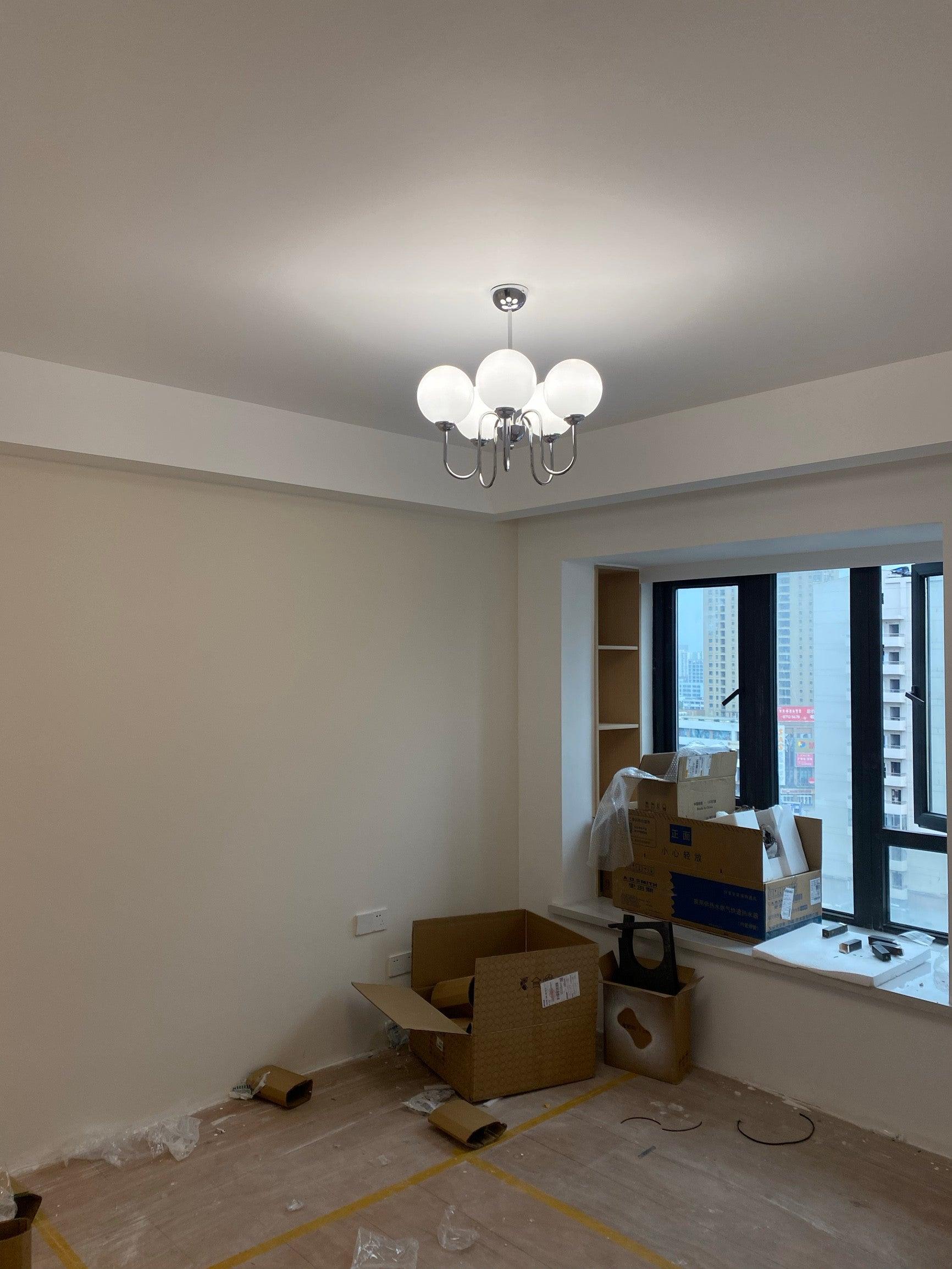Modern Glass Globe Crown Chandelier with Elegant Chrome Curved Arms