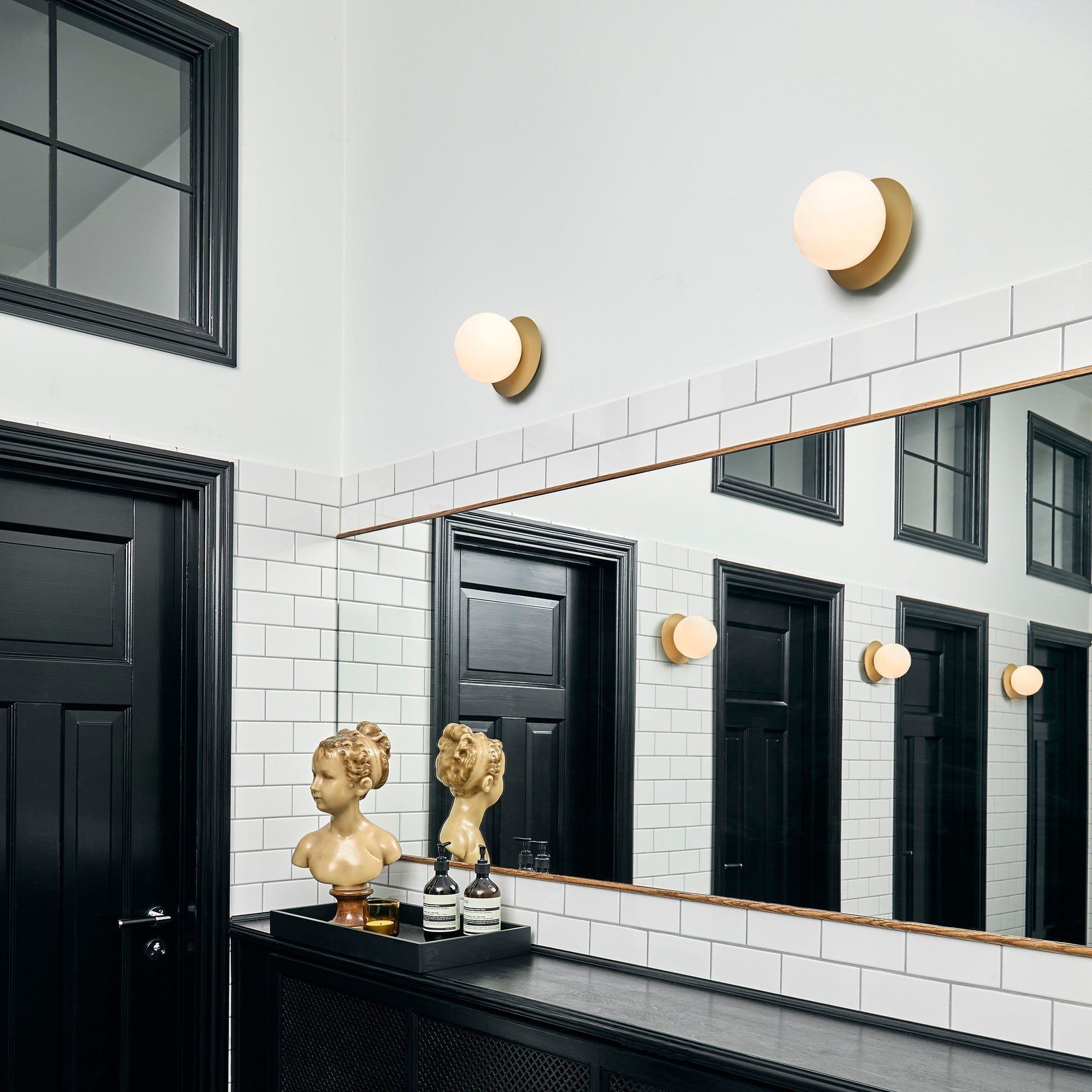 Modern Glass Globe Wall Sconce and Ceiling Lamp with Brass Metal Disc for Elegant Interior Decor