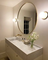 Modern Glass Globe Wall Sconce and Ceiling Lamp with Brass Metal Disc for Elegant Interior Decor