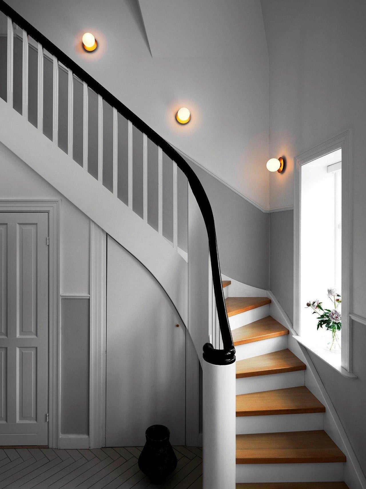 Modern Glass Globe Wall Sconce and Ceiling Lamp with Brass Metal Disc for Elegant Interior Decor