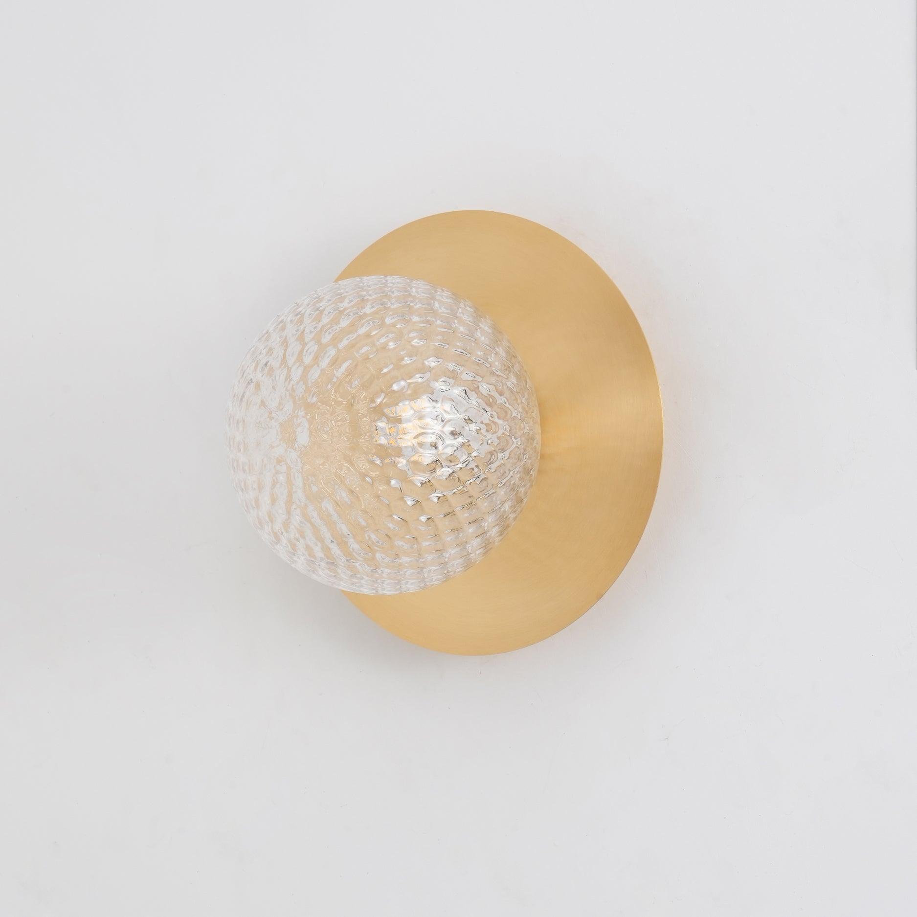 Modern Glass Globe Wall Sconce and Ceiling Lamp with Brass Metal Disc for Elegant Interior Decor