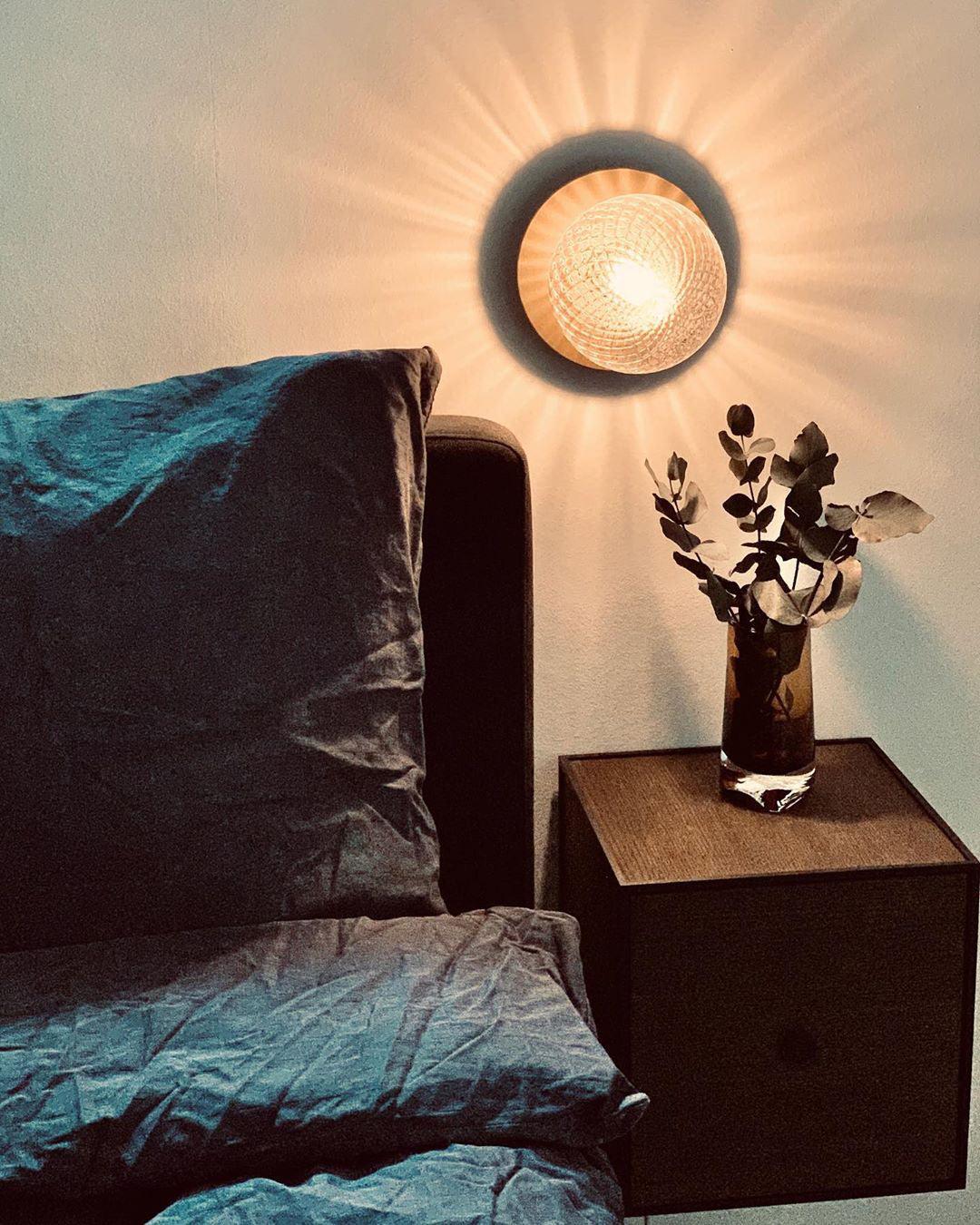 Modern Glass Globe Wall Sconce and Ceiling Lamp with Brass Metal Disc for Elegant Interior Decor
