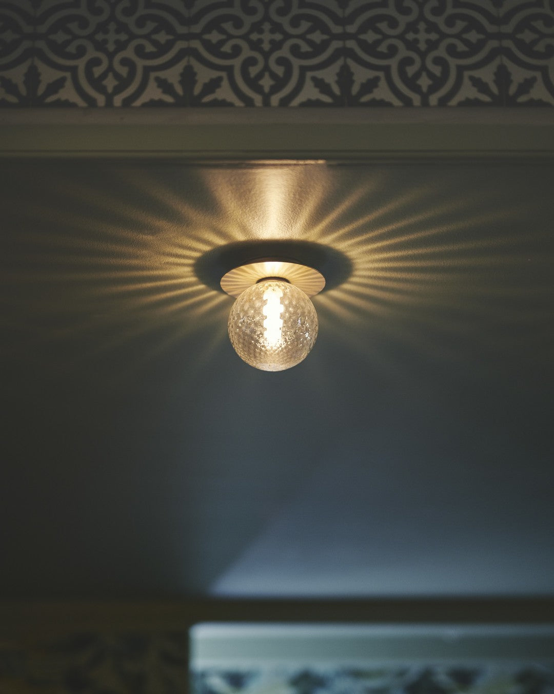 Modern Glass Globe Wall Sconce and Ceiling Lamp with Brass Metal Disc for Elegant Interior Decor