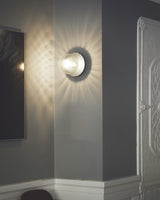 Modern Glass Globe Wall Sconce and Ceiling Lamp with Brass Metal Disc for Elegant Interior Decor