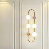 Modern Glass Globe Wall Sconce with Gold Metal Branch and Vertical Hanging Rod