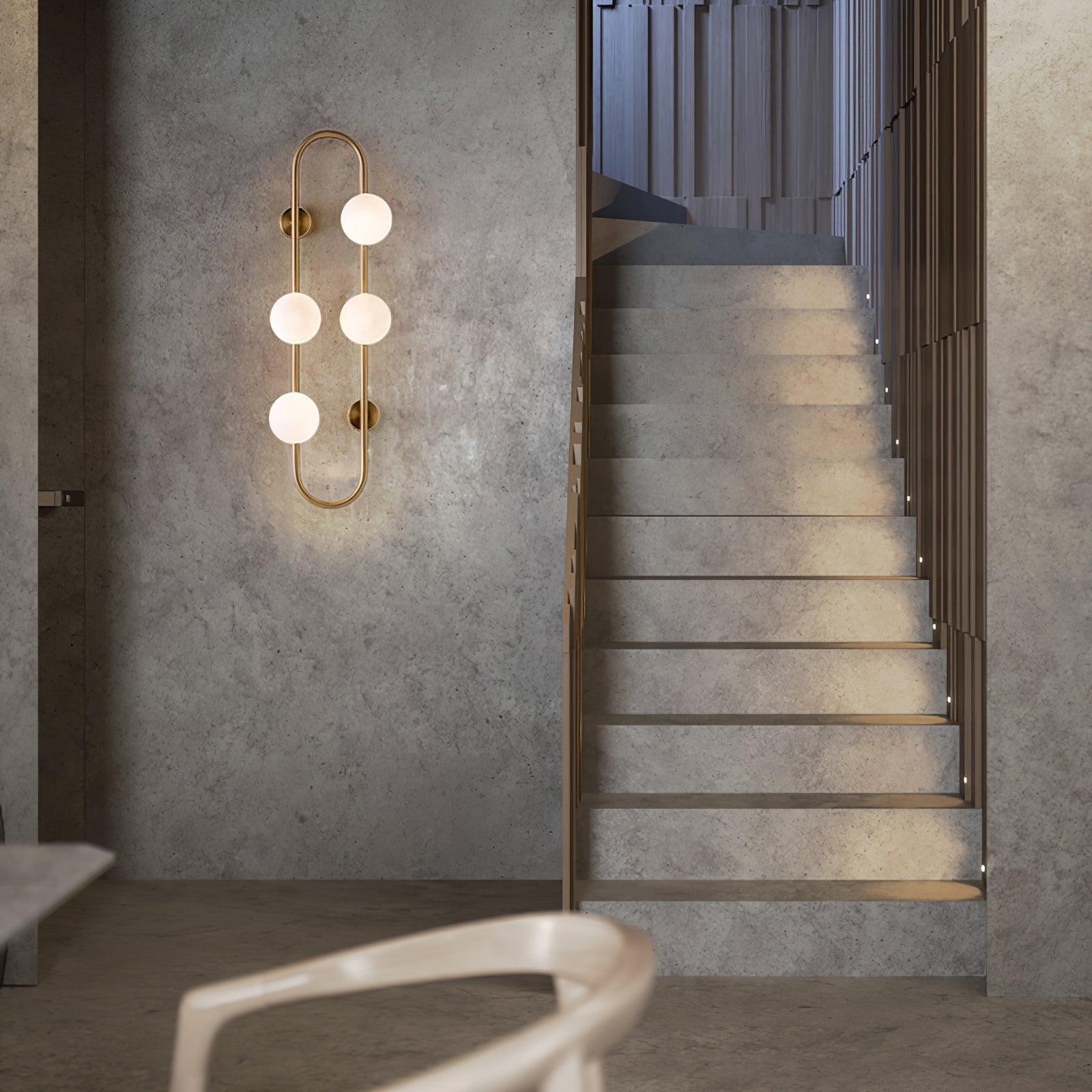 Modern Glass Globe Wall Sconce with Gold Metal Branch and Vertical Hanging Rod
