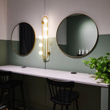 Modern Glass Globe Wall Sconce with Gold Metal Branch and Vertical Hanging Rod