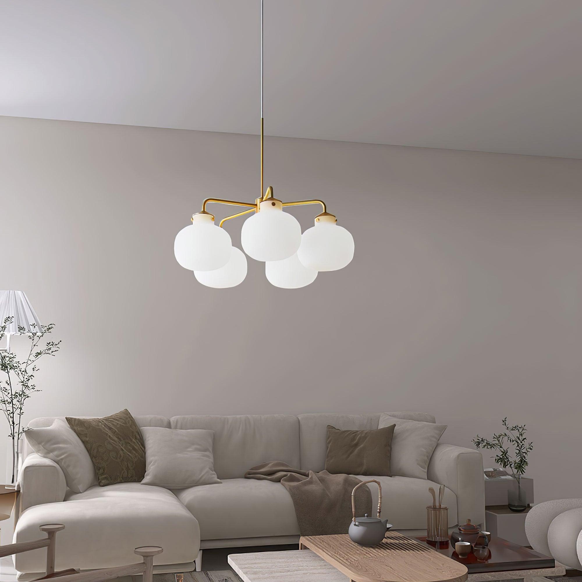 Modern Gold Metal and Opal Glass Globe Pendant Light for Contemporary Interiors