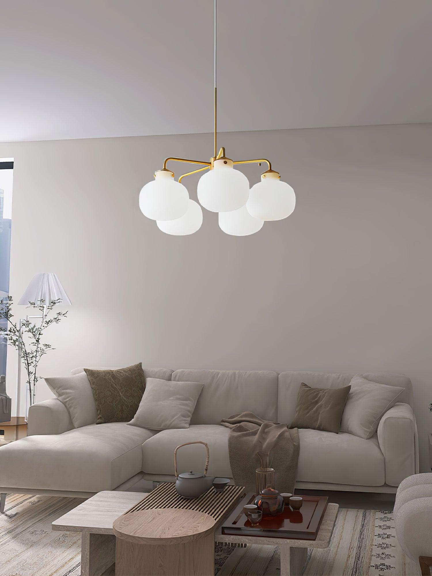 Modern Gold Metal and Opal Glass Globe Pendant Light for Contemporary Interiors