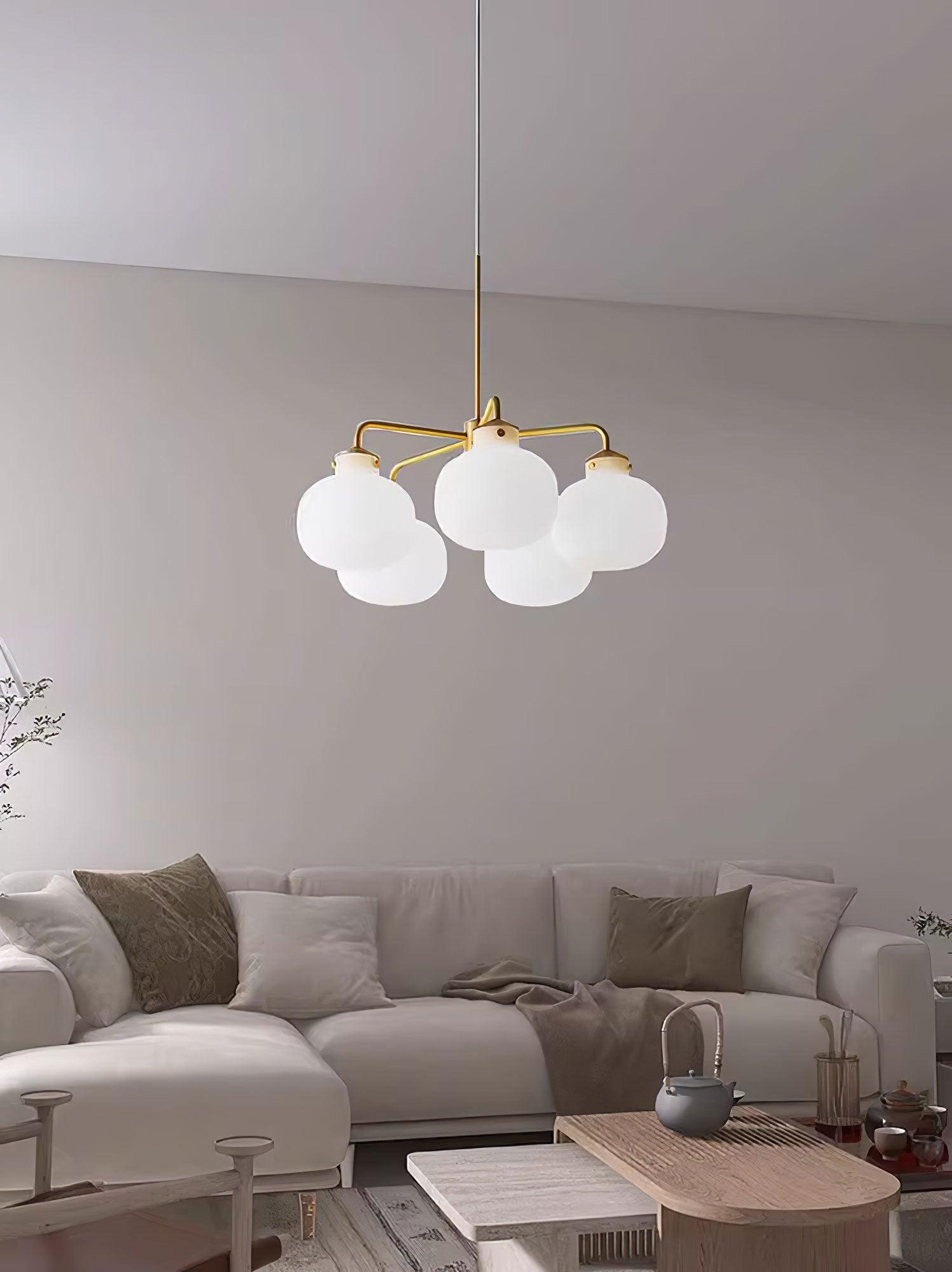 Modern Gold Metal and Opal Glass Globe Pendant Light for Contemporary Interiors