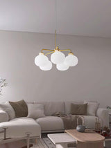 Modern Gold Metal and Opal Glass Globe Pendant Light for Contemporary Interiors