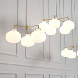 Modern Gold Metal and Opal Glass Globe Pendant Light for Contemporary Interiors