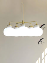 Modern Gold Metal and Opal Glass Globe Pendant Light for Contemporary Interiors
