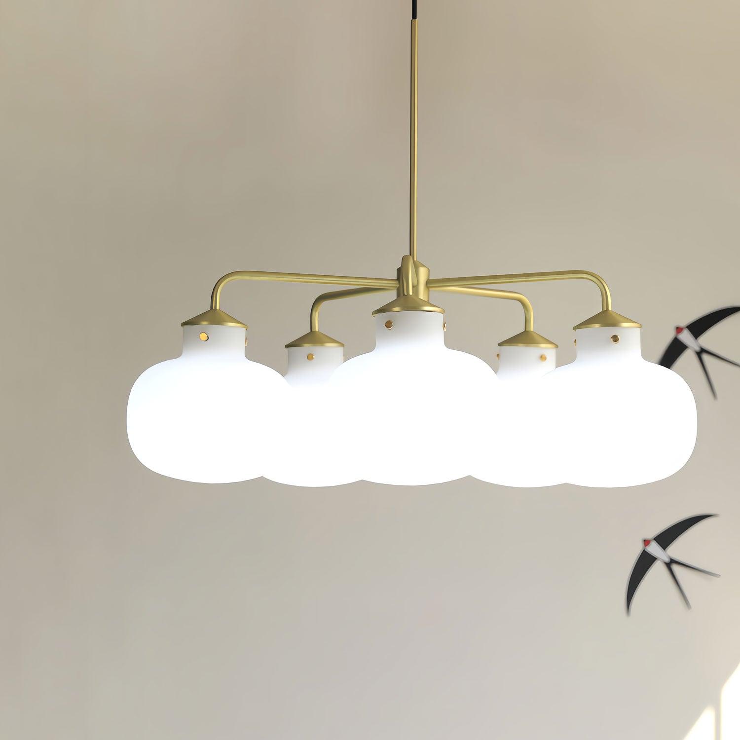 Modern Gold Metal and Opal Glass Globe Pendant Light for Contemporary Interiors