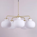 Modern Gold Metal and Opal Glass Globe Pendant Light for Contemporary Interiors